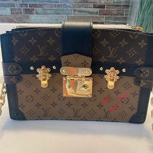 Louis Vuitton trunk clutch